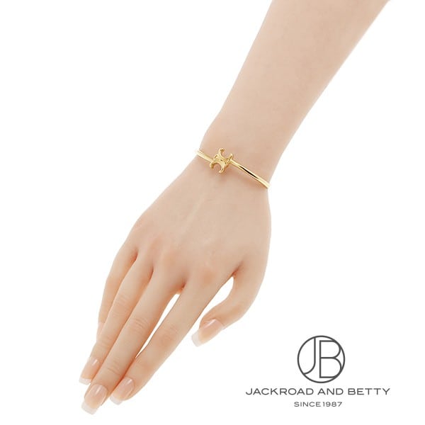 トリオンフ アシンメトリック カフ / ゴールドフィニッシュ ブラス